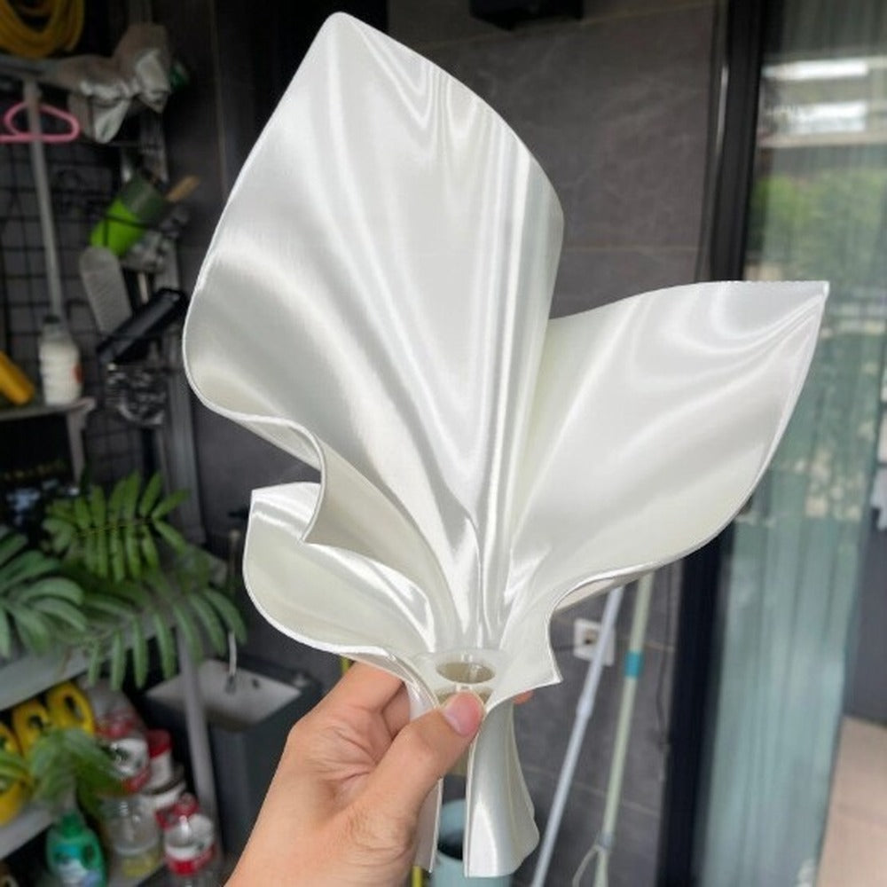 White bouquet vase in hand