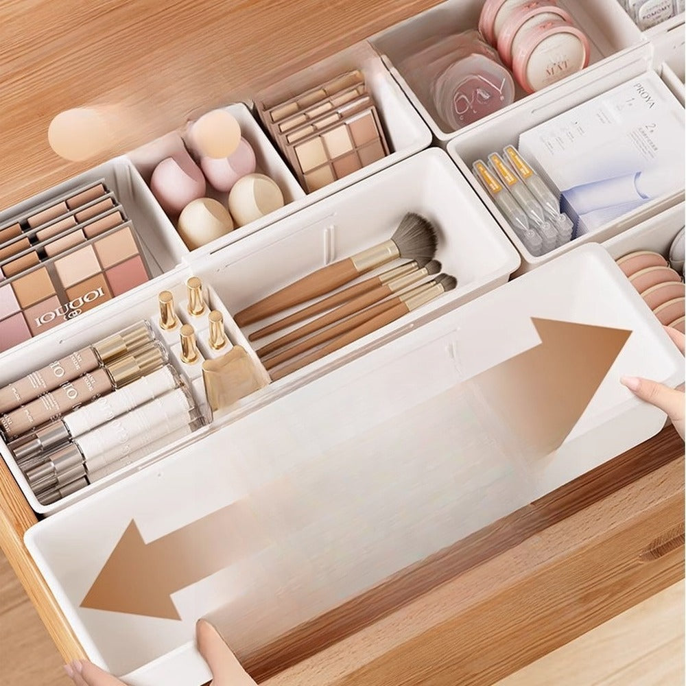 Makeup drawer organized with expandable bins