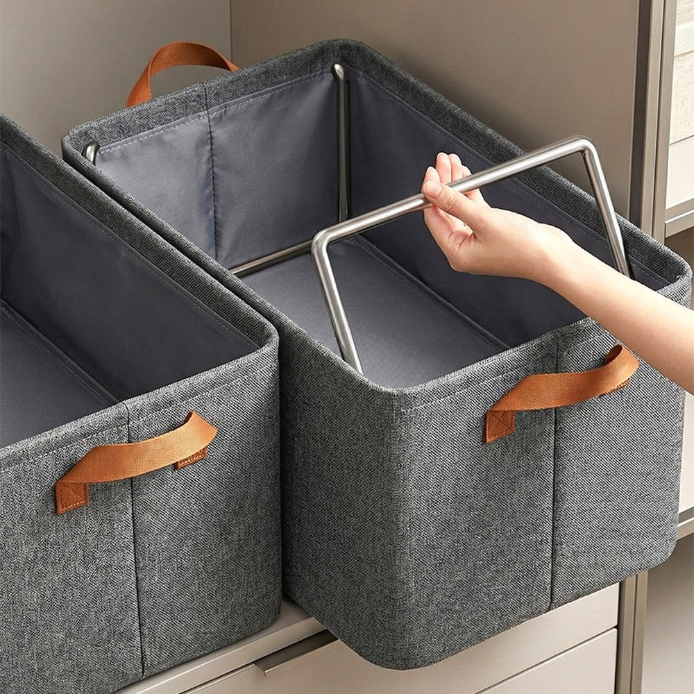 Fabric storage bin with sturdy steel frame inside