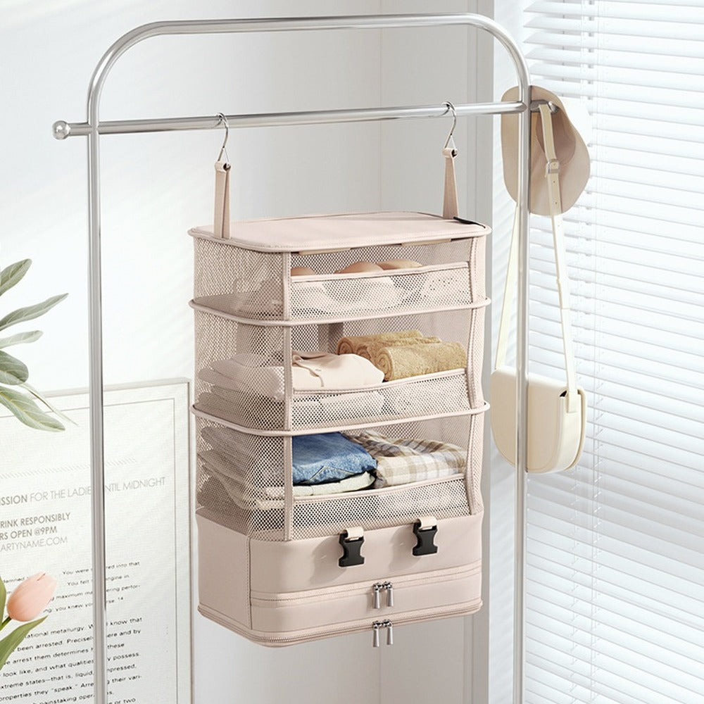 Hanging travel organizer on a clothes rail