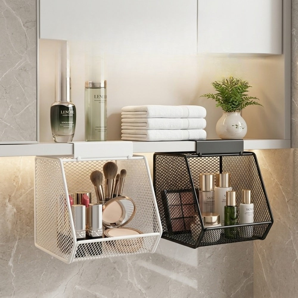 White and black under-shelf baskets holding makeup below a bathroom shelf