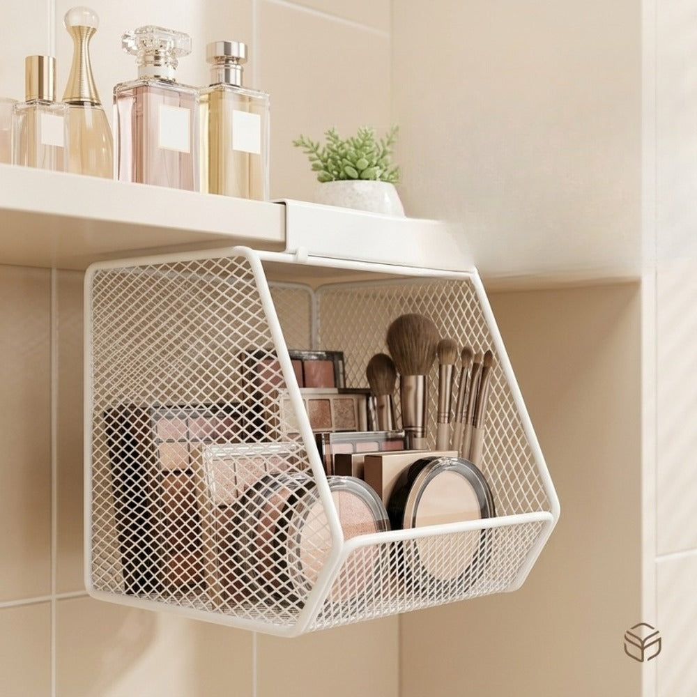 White mesh basket with makeup hanging under a shelf