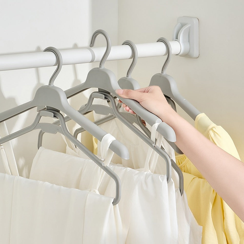 Long dress hung at half length with hem hook hanger