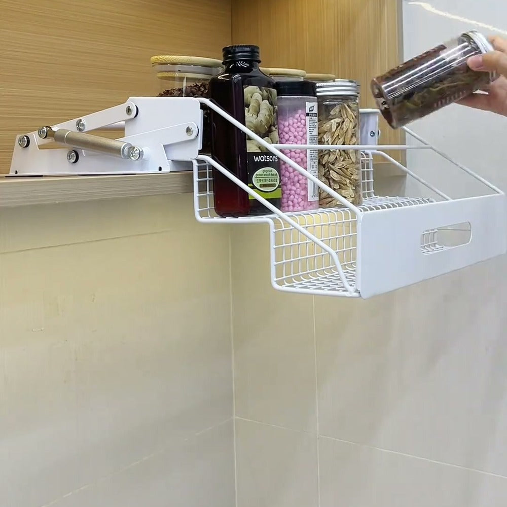 White pull-down spice rack lowered with spice jars