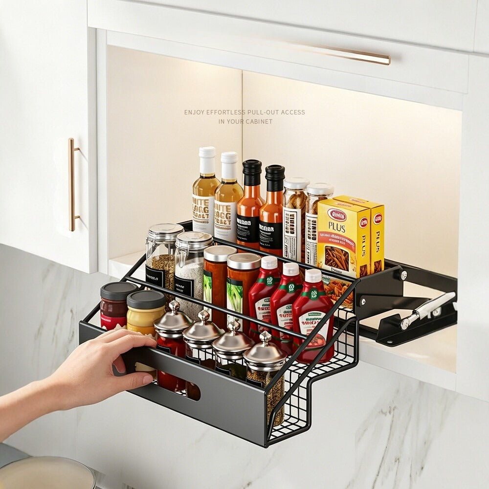 Pulling the black spice rack down from an upper cabinet