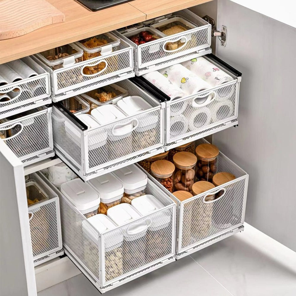 Pull-out mesh baskets organizing a kitchen cabinet