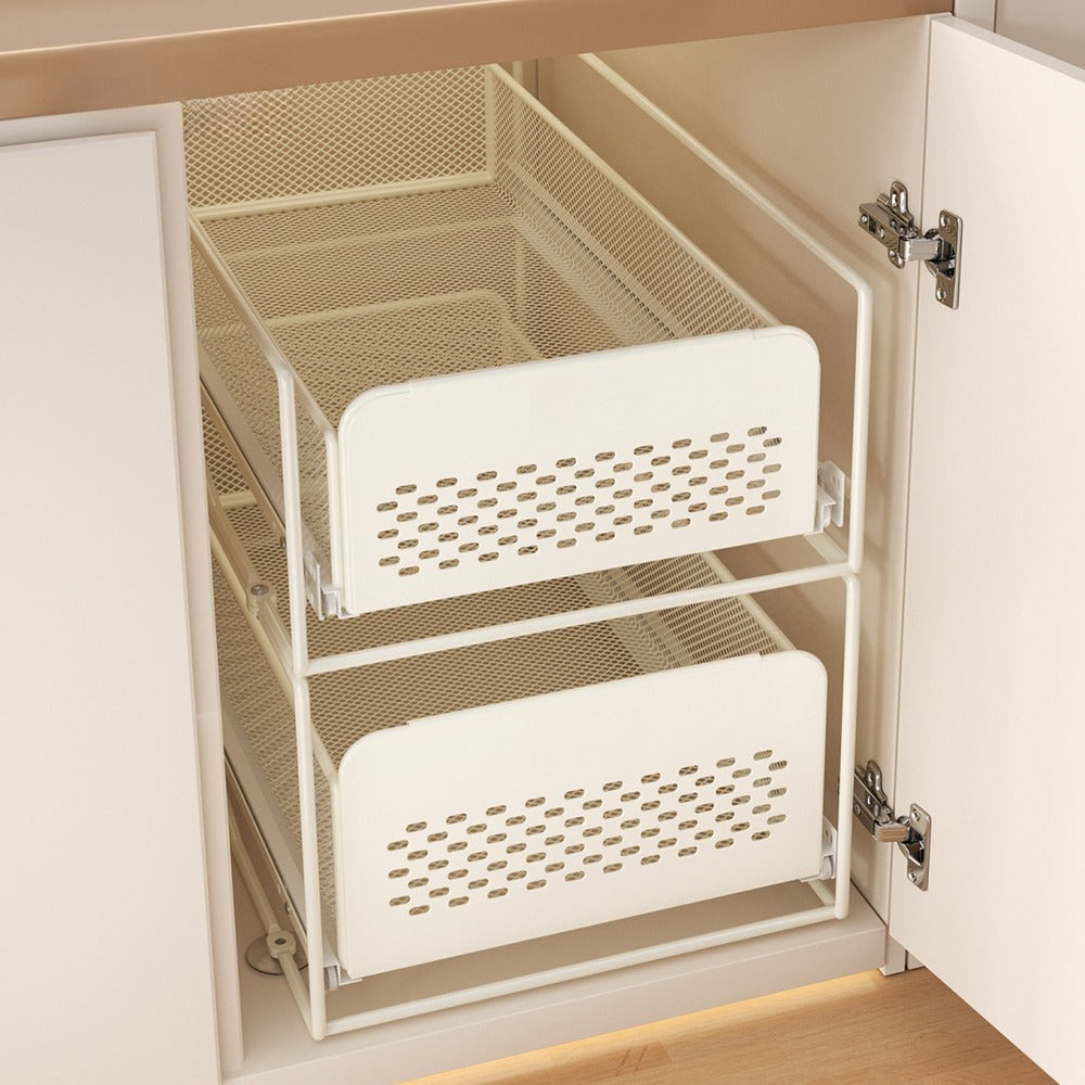 Pull-out drawer basket in a cabinet
