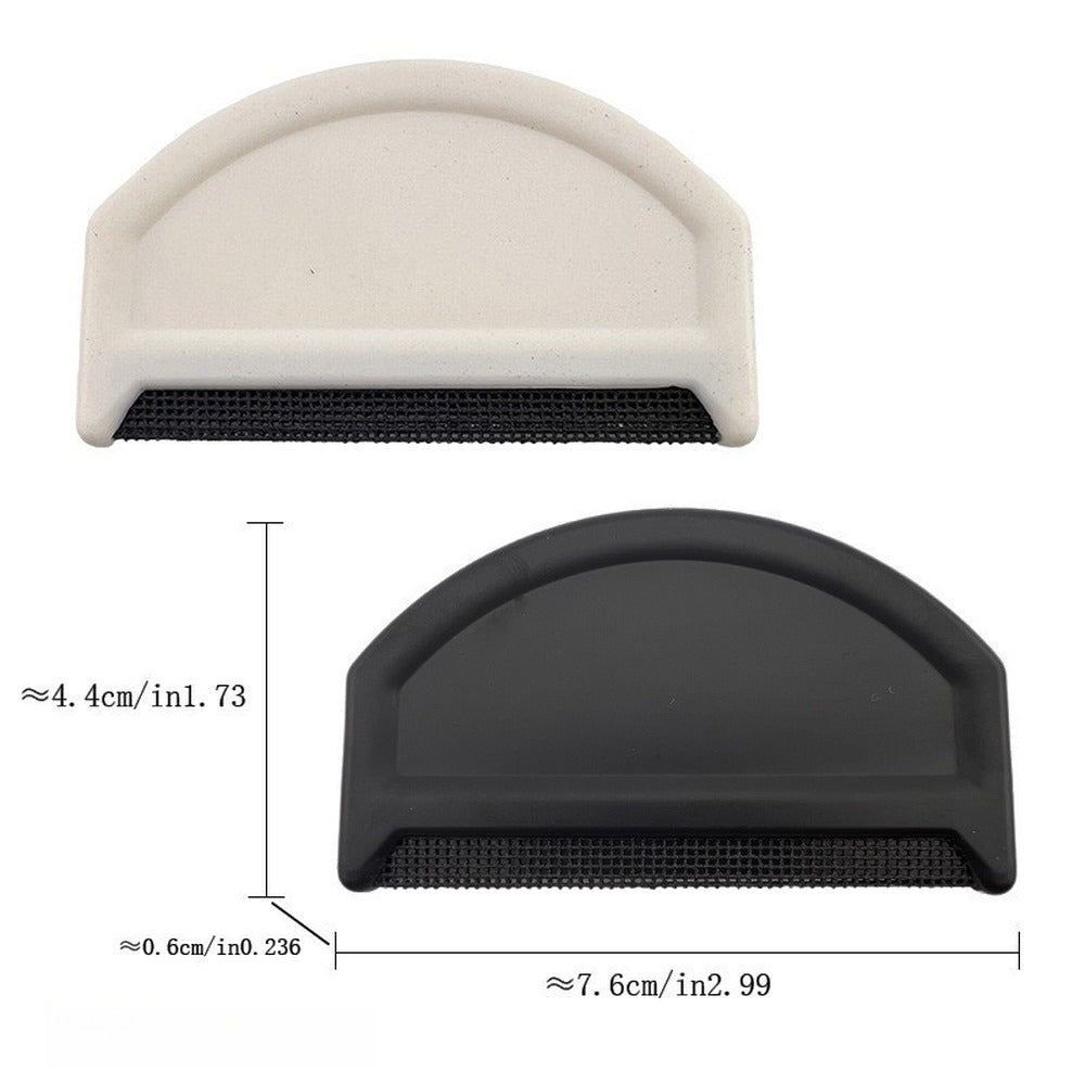 White and black sweater combs