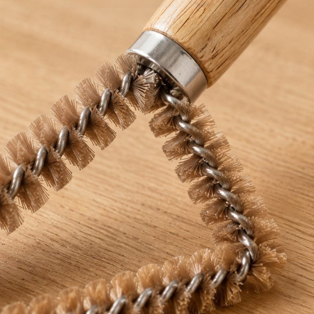 Twisted steel core brush head