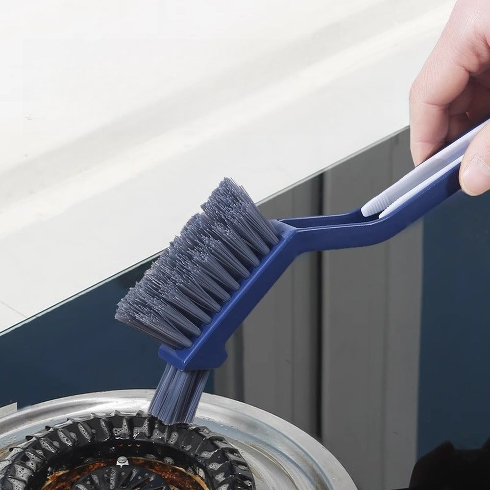 Small head scrubbing a stove ring