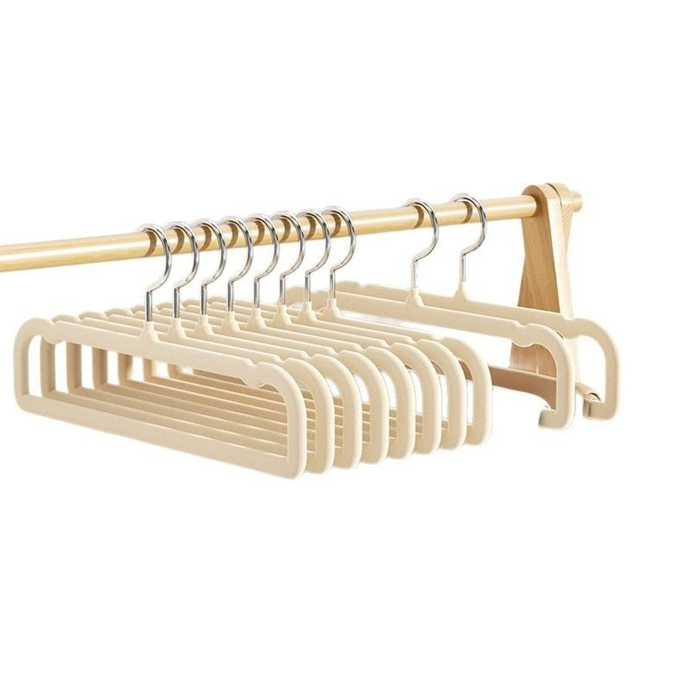 Velvet open-end pants hangers on a rail