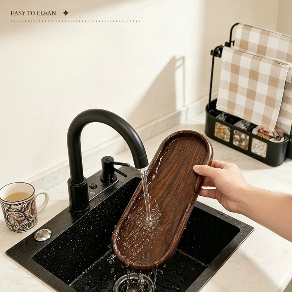 Removable drip tray rinsed under the tap