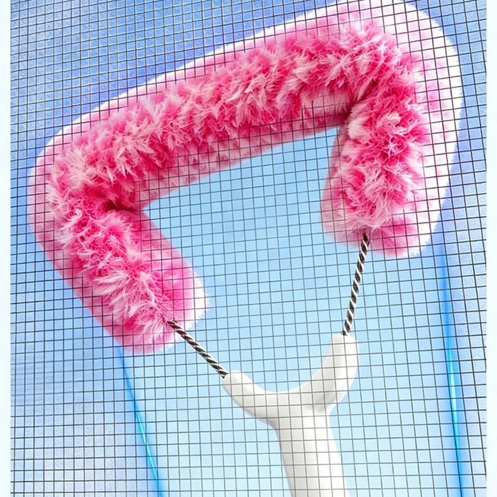 Close-up of the screen brush on window mesh